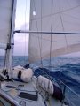That little blue speck at the front of the boat would be Bruce doing repairs in the middle of the Pacific